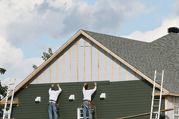 Professional Siding Repair technician working in Ludlow Falls, OH